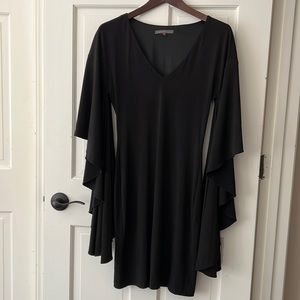 Black cocktail dress, brand Issue New York size medium with a good condition
